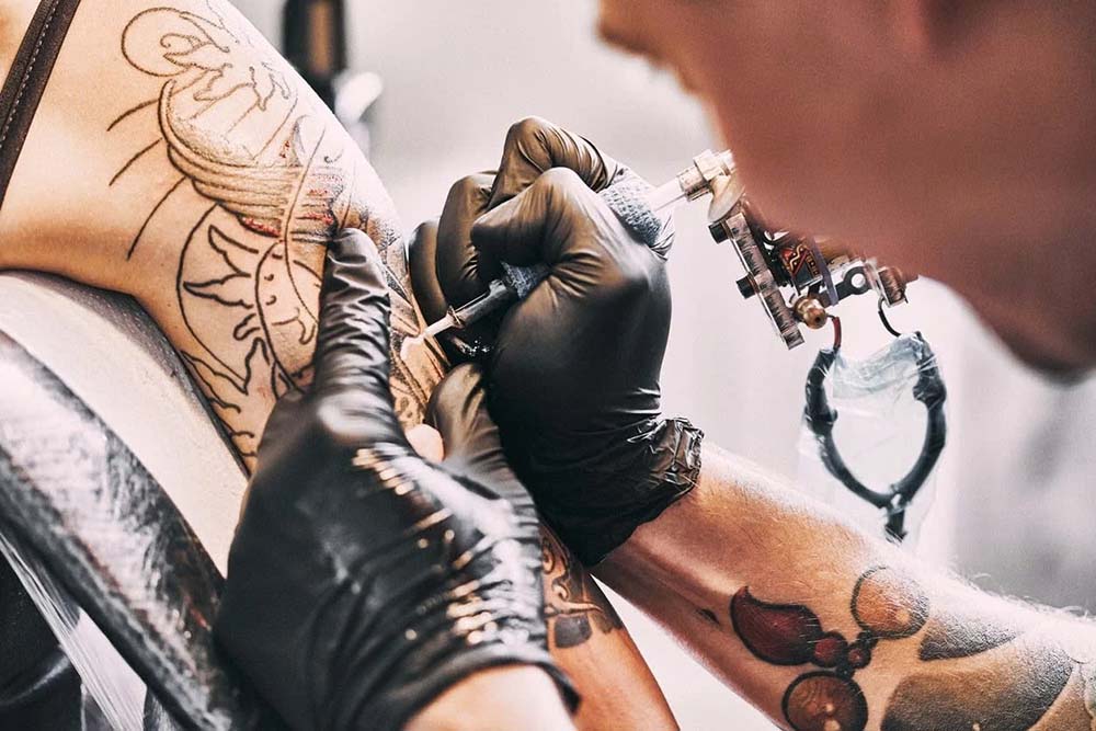 Least Painful Places To Get A Tattoo