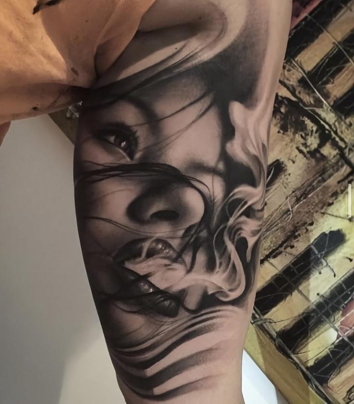 Realistic Pet Portrait Tattoo With Detailed Fur And Eyes