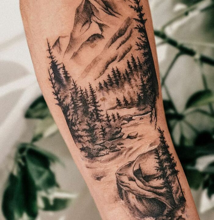 Nature inspired tattoos feature mountains, trees, oceans, clouds, and other elements inspired by the natural world.
